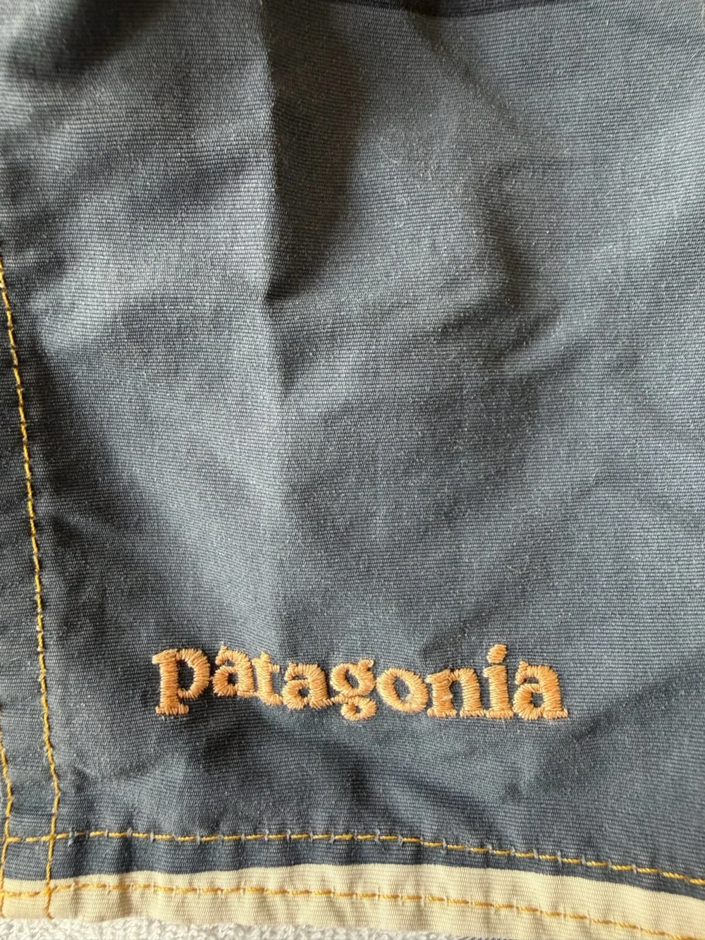 Patagonia Men’s Navy, Yellow & Light Blue Striped Board Shorts